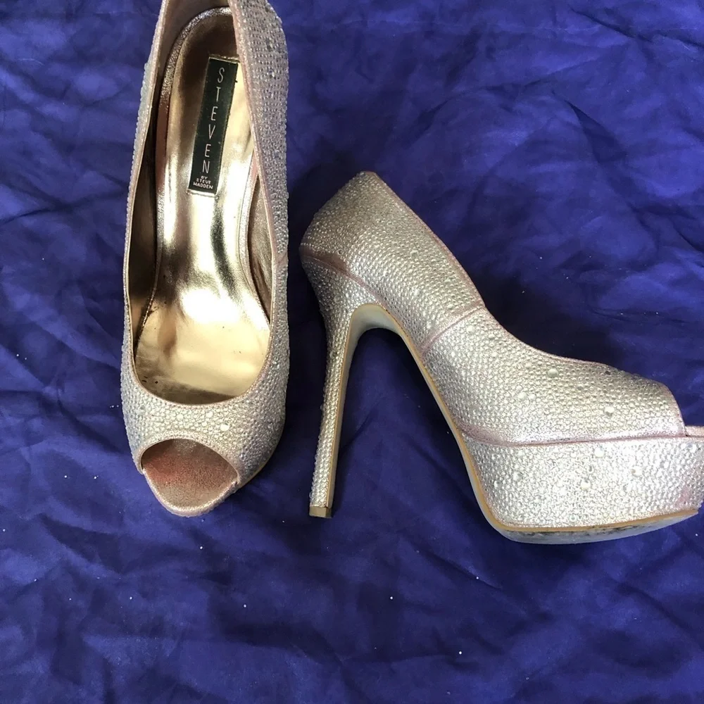 Size 9.5 Steve Madden, rhinestone platform pumps.